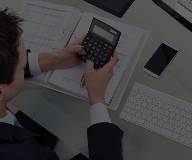 Men calculating tax